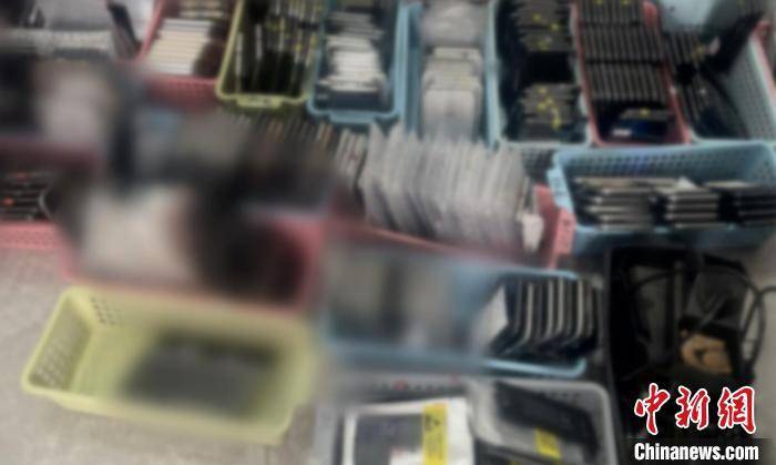 精仿手机:广东警方破获一宗特大生产销售假冒注册商标商品案